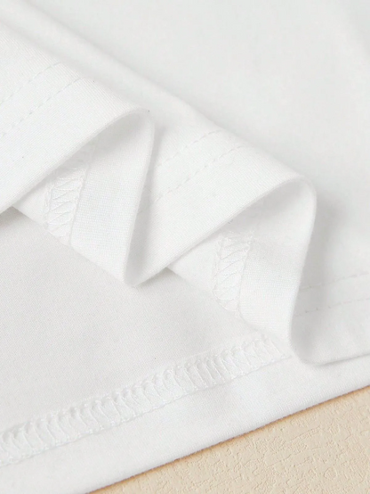 Close-up of white fabric details on a trendy crop top for women by Multypros