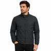 Dark Jacket Studio Portrait Man wearing a mens black jacket with a stand collar, full front zipper, two zippered side pockets and elastic cuffs, creating a clean modern casual and streetwear look.