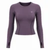 Plum Top – Front Women’s plum purple technical performance top with long sleeves, contoured body panels, breathable mesh side panels, flatlock stitching, crew neck, and thumbhole cuffs