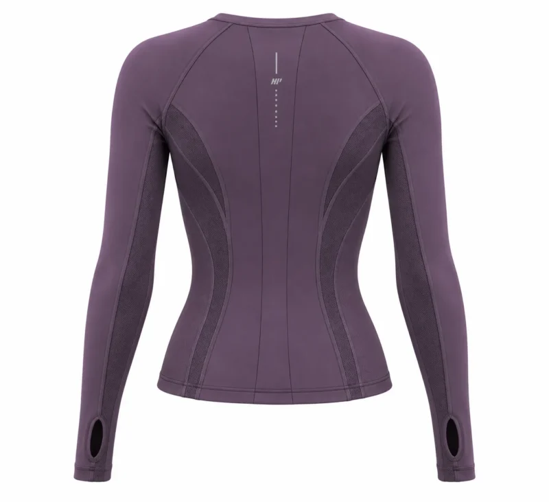 Back view of women’s plum technical performance top featuring ergonomic panel seams, breathable mesh ventilation panels, center back detailing, long sleeves, and thumbhole cuffs
