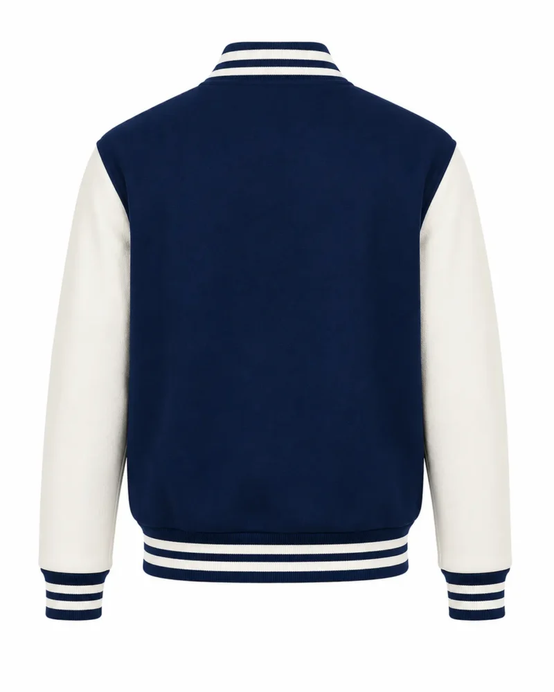 Blue varsity jacket back view with contrasting white leather sleeves, striped ribbed waistband and cuffs, classic letterman styling and customizable back design.
